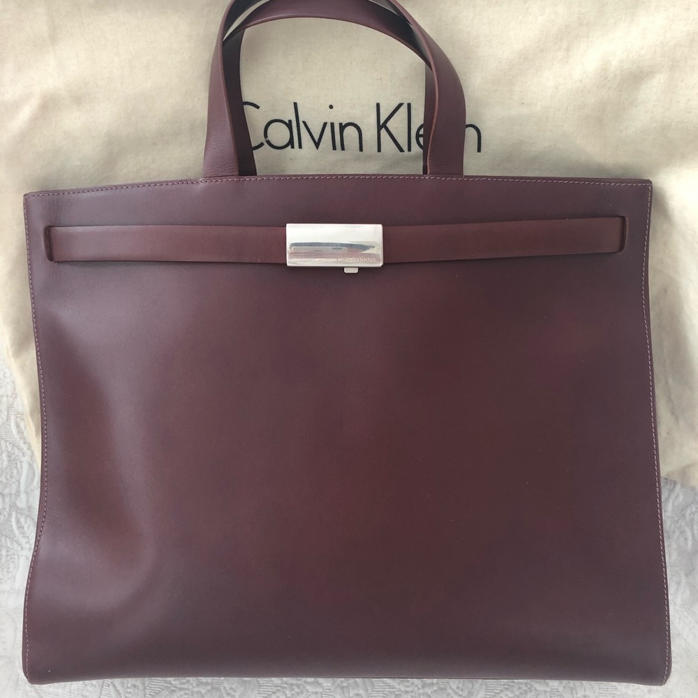 NWT Calvin Klein mahogany leather briefcase.  Made in Italy.  $200.00.